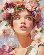 Woman with flower crown looking up cross stitch kit for beginners