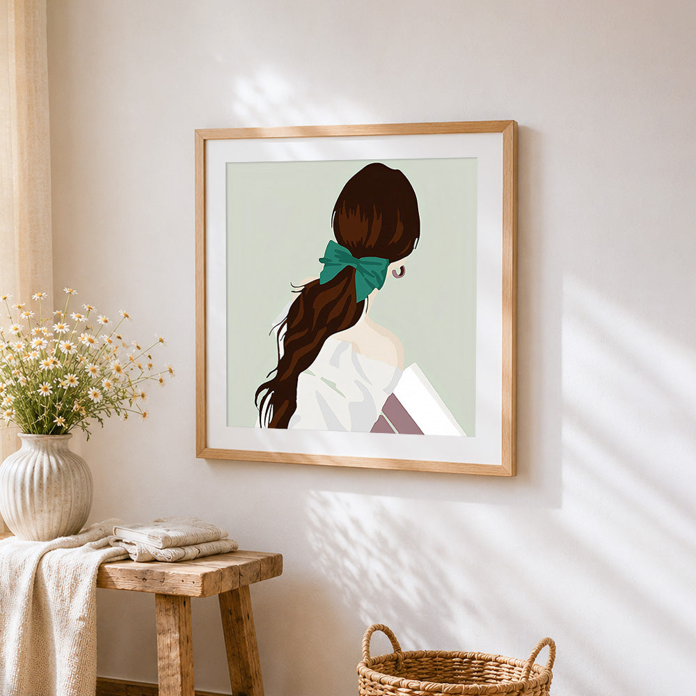 Woman with ponytail cross stitch artwork displayed on wall as home decor