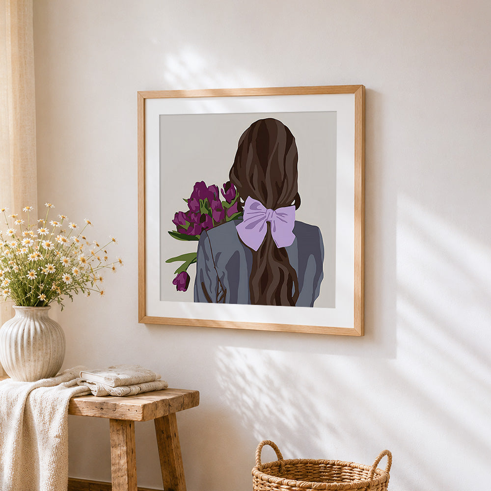 Woman with purple flowers and lilac bow cross stitch artwork displayed on wall as home decor