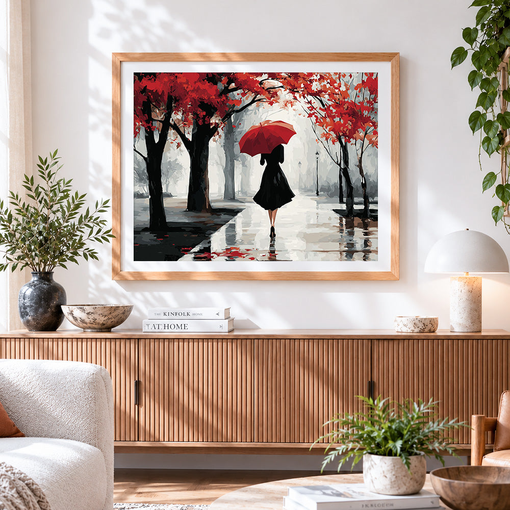 Finished woman with red umbrella in autumn rain paint by numbers artwork displayed as home decor