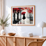 Woman with red umbrella in autumn rain paint by numbers artwork displayed on wall as home decor