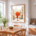 Woman with red umbrella in paris cross stitch artwork displayed on wall as home decor