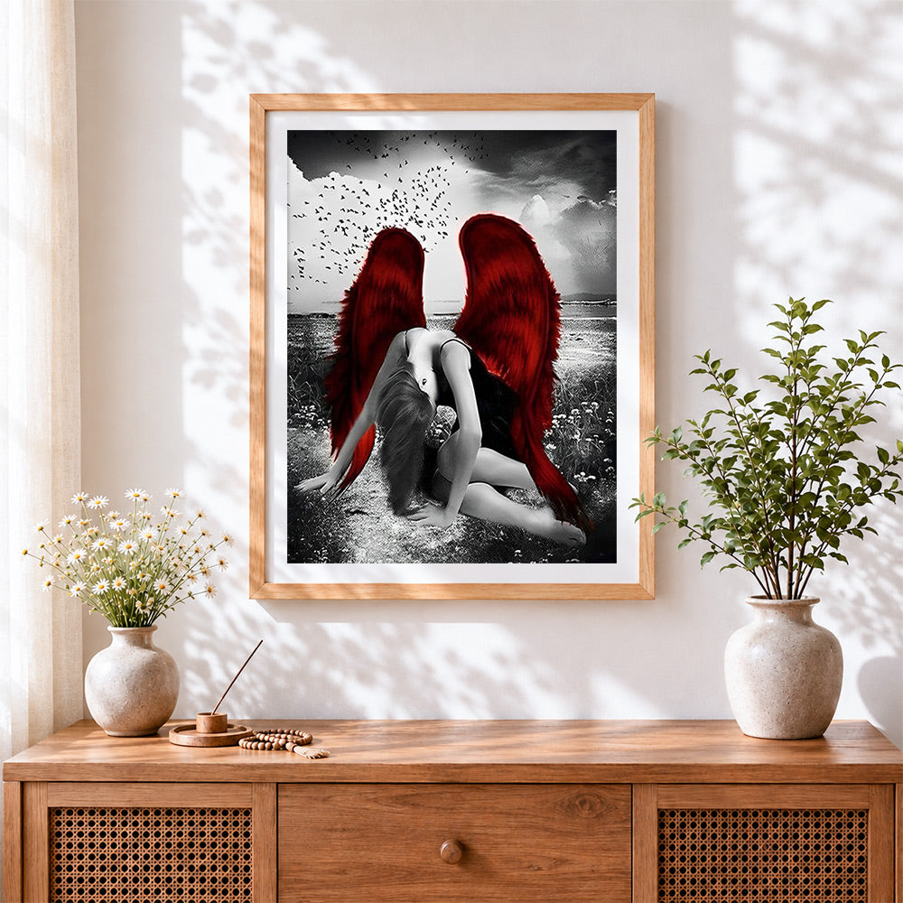 Finished woman with red wings paint by numbers artwork displayed as home decor