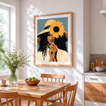 Woman with sunflower and straw hat cross stitch artwork displayed on wall as home decor