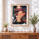Finished woman with sunglasses and cigarette cross stitch artwork displayed