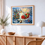 Woodland animals and sleigh full of presents cross stitch artwork displayed on wall as home decor