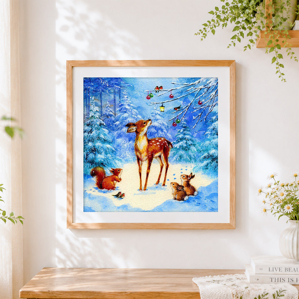 Finished woodland deer and squirrel in snow cross stitch artwork displayed