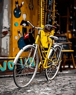 Yellow bicycle in the city cross stitch kit for beginners