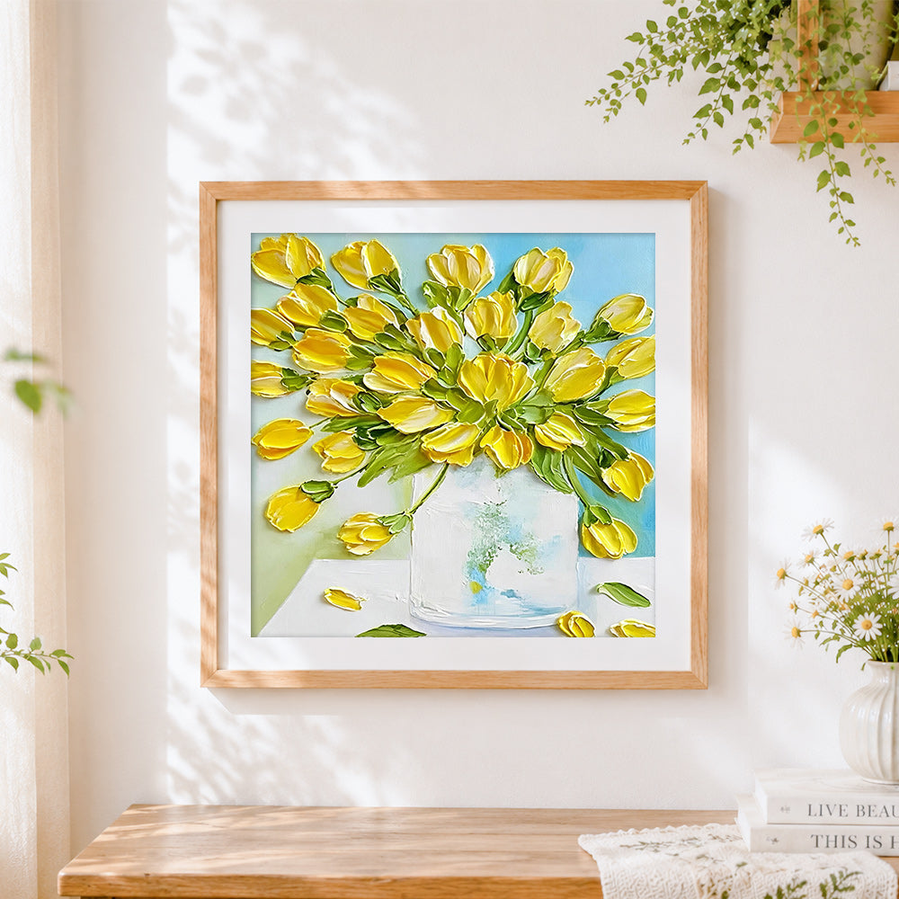 Finished yellow tulips in a vase cross stitch artwork displayed