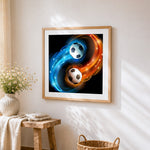 Yin yang footballs in fire and water cross stitch artwork displayed on wall as home decor