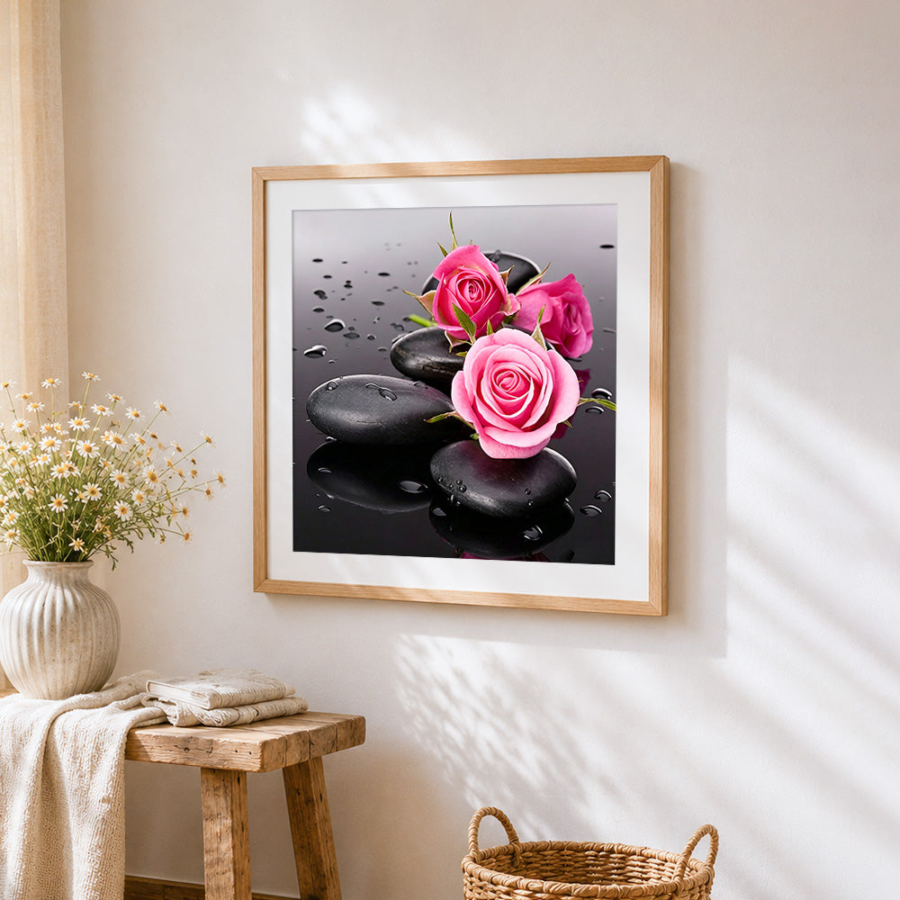 Zen black stones and pink roses paint by numbers artwork displayed on wall as home decor