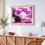 Zen stones and pink orchids paint by numbers artwork displayed on wall as home decor